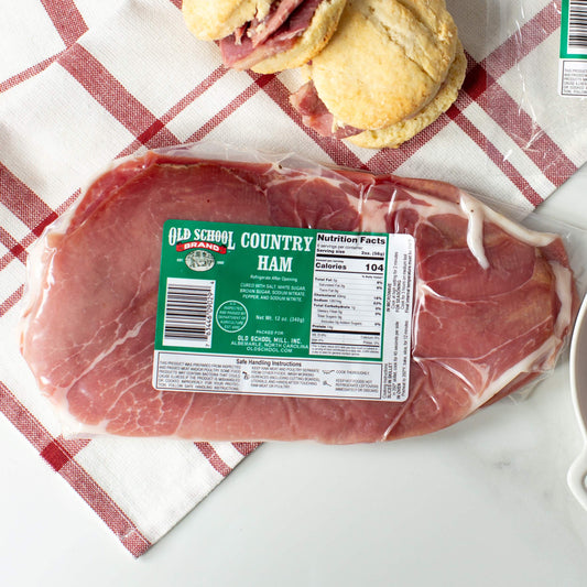 Package of 12 oz country ham on a red and white napkin